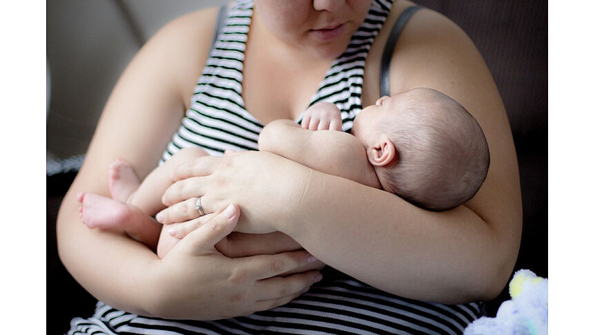 Women with a Baby in her Arms